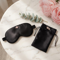Onyx Dream silk eye mask and pouch set flat lay