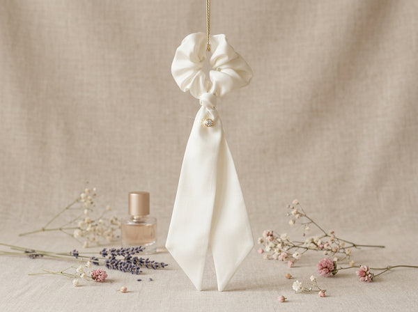 Gala ivory silk scrunchie with crystal below knot - vertical lifestyle